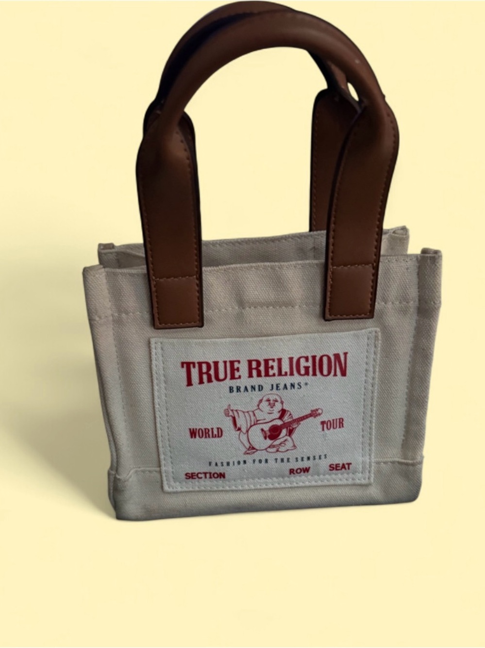 TRUE RELIGION CANVAS TOTE IN CREAM